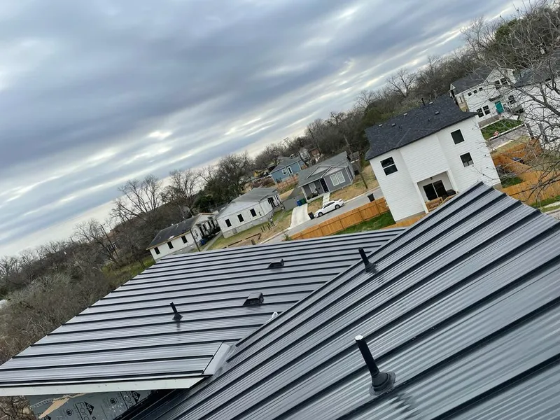 Standing seam metal roof panels with vents for Skylight Repair in La Grange Park